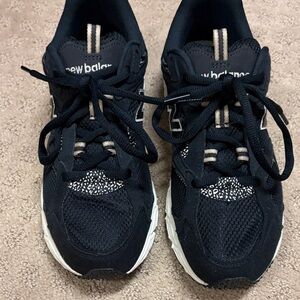 New Balance Dark Sneakers with White Accents